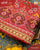 Exclusive Marodi Work Navratna Design Red Semi Double Ikat Rajkot Patola Saree